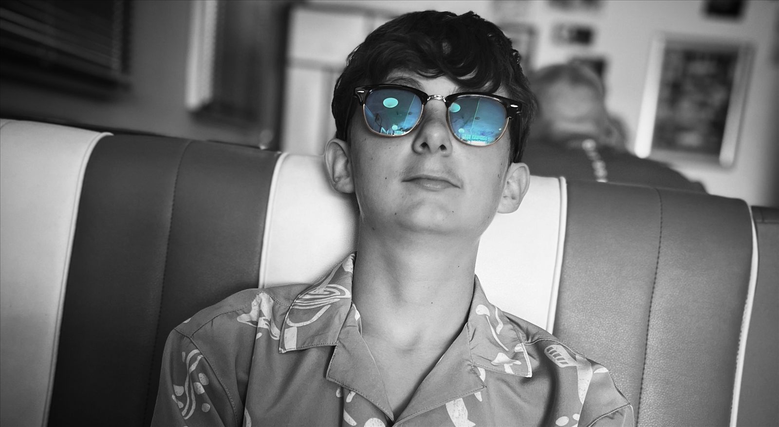 Black and white profile portrait of DJ Zac Harris