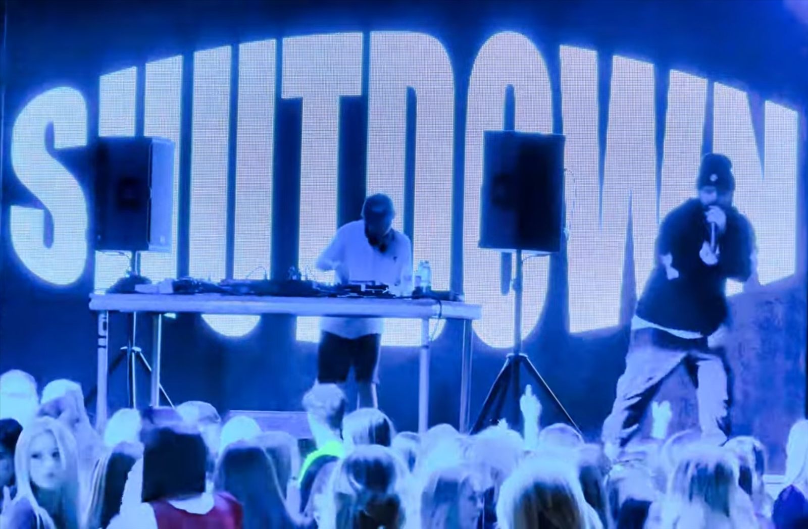 Zac Harris on stage at Shutdown with the crowd in front â€” UK tech house DJ
