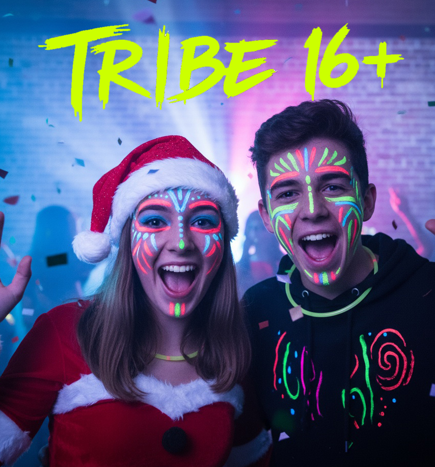 Two Teeangers at Christmas Teen Rave girl in a santa outfit with a boy both with neon face paint