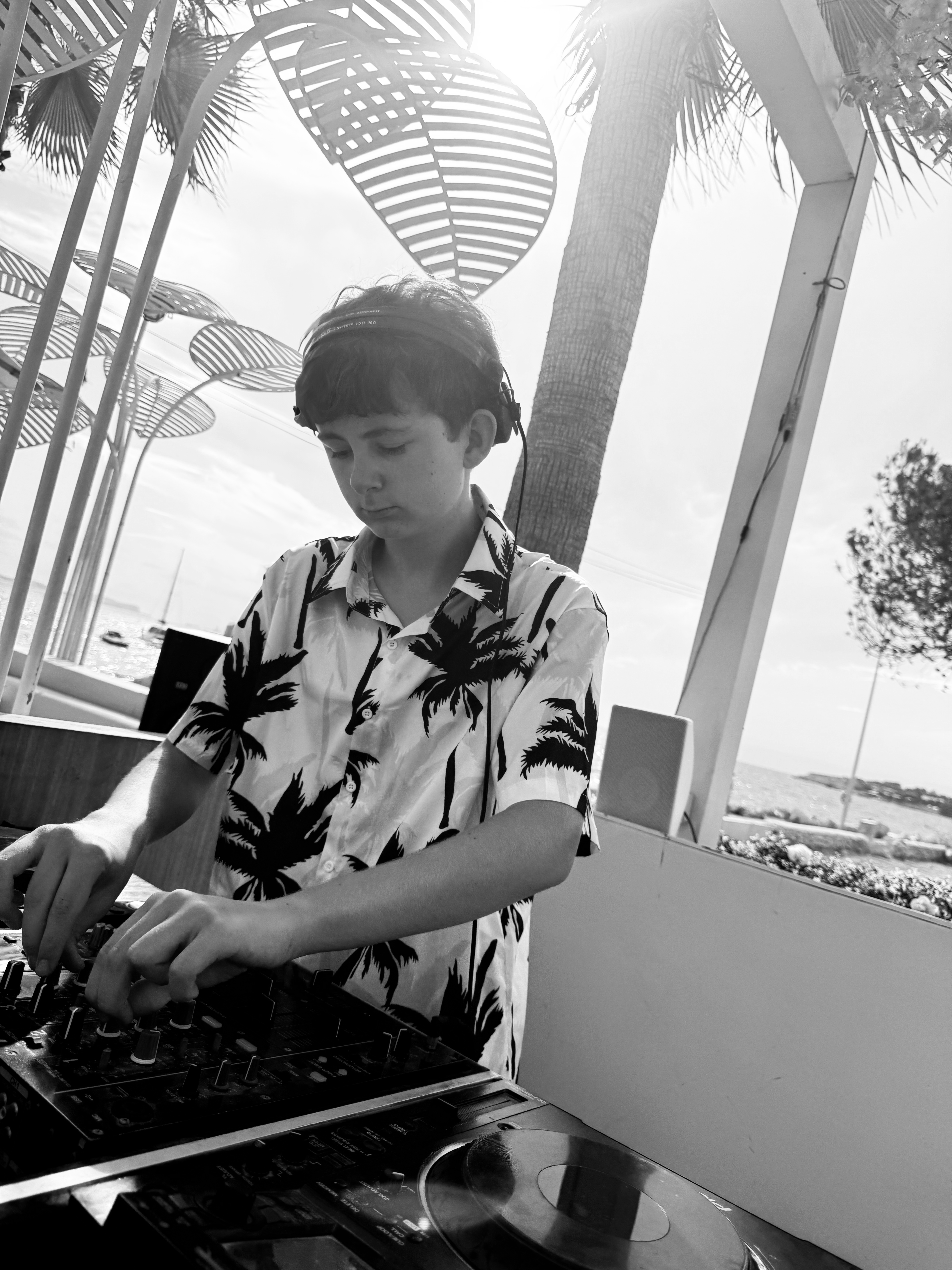 Zac Harris DJing at WikiWoo Ibiza sunset